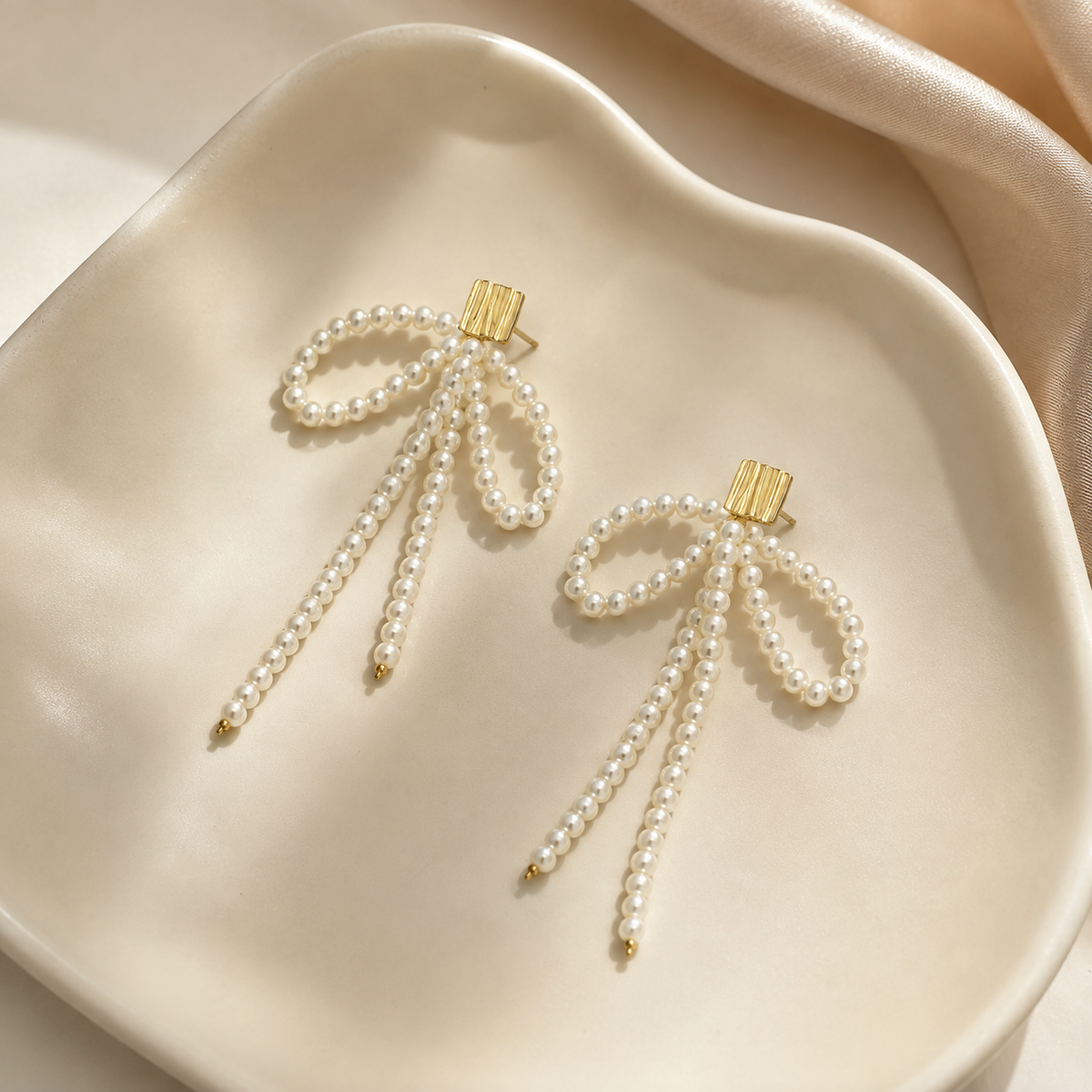 Bow Pearl Tassel Earrings
