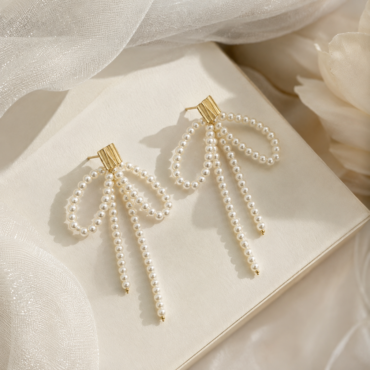 Bow Pearl Tassel Earrings