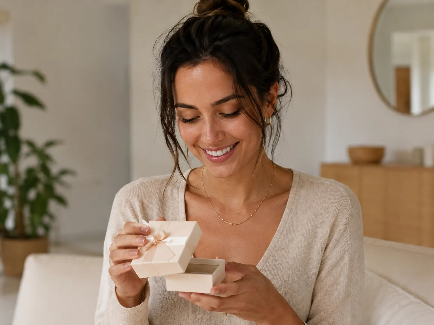 Customer-style lifestyle photo opening a jewelry gift box